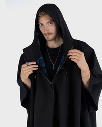 "*MALE* wearing Black dryrobe® Waterproof Changing Poncho with hood up"