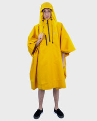 *MALE* wearing  Yellow dryrobe® Waterproof Poncho with hood and zip up 