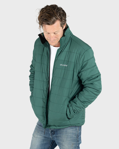 Man wearing dryrobe Mid-Layer Jacket in Hunter Green unzipped
