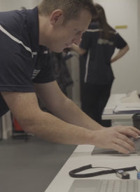 Sports scientists testing and analysing cold water immersion before and after wearing Dryrobe® advance long sleeve