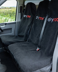 1|Single and double Black dryrobe® Water-repellent Car Seat Covers shown in a van