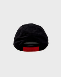 Back of black dyrobe® quick dry cap showing red velcro adjustable band 